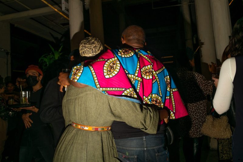 Artist Hank Willis Thomas and Manushka Magloire embracing